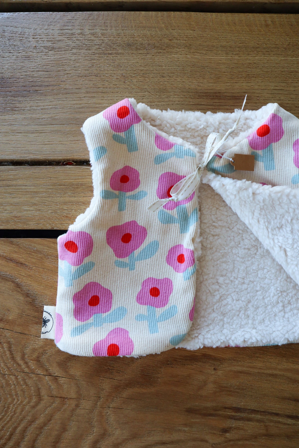 Gilet de berger bébé & enfant réversible – Motifs fleurs rose et bleu
