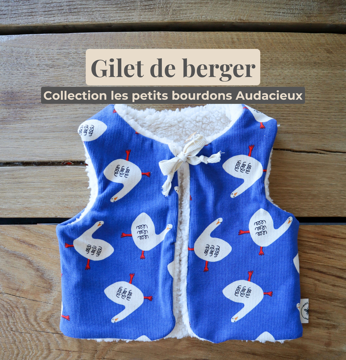 Gilet de berger bébé & enfant réversible – Motifs oies sur fond bleu