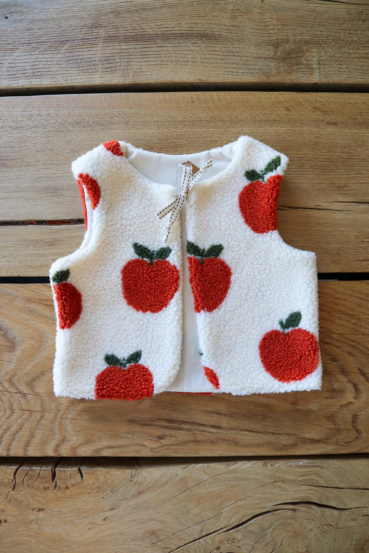 Gilet de berger bébé & enfant réversible – Fourrure à motifs pommes