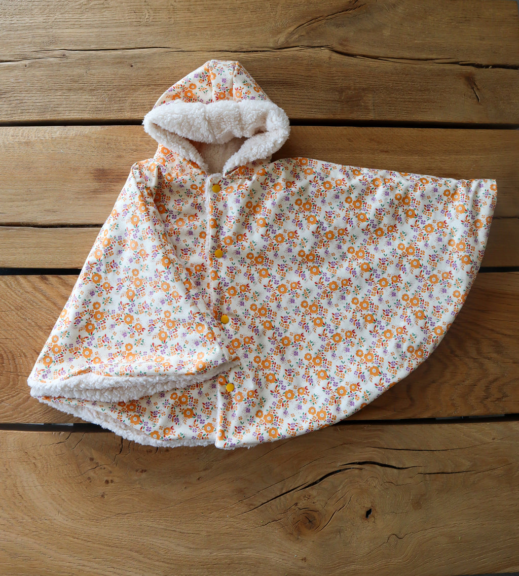 Poncho imperméable motifs fleurs